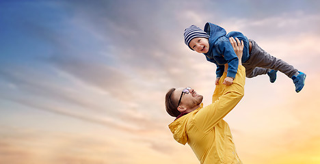 Image showing father with son playing and having fun outdoors