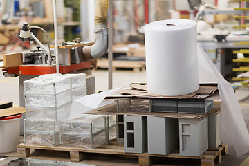 Image showing roll of foam wrap at woodworking factory workshop