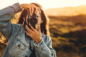 Image showing Woman Taking Picture Outdoors