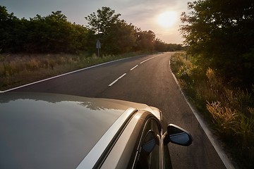 Image showing Driving a car