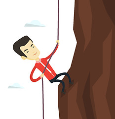 Image showing Business man climbing on the mountain.
