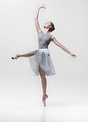 Image showing Young classical dancer isolated on white background.