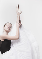 Image showing Young classical dancer isolated on white background.