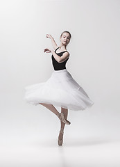 Image showing Young classical dancer isolated on white background.