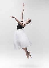 Image showing Young classical dancer isolated on white background.