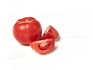 Image showing The fresh tomatoes on white background