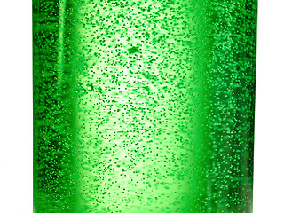 Image showing abstract background : bubble of sparkling water soda on the green glass bottle with gradient light