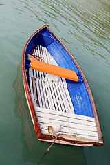 Image showing Old wooden boat on the lake