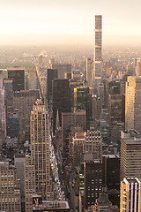 Image showing New York City skyline with urban skyscrapers at sunset, USA.