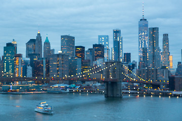 Image showing Out of focus image of Brooklyn Bridge and Lower Manhattan skyline at night, New York city, USA.