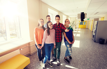 Image showing group of students taking selfie with smartphone