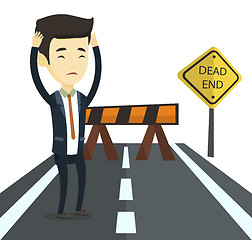 Image showing Business man looking at road sign dead end.