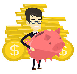 Image showing Business man holding big piggy bank.