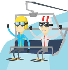 Image showing Two happy skiers using cableway at ski resort.