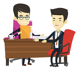 Image showing Two businessmen during business meeting.