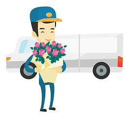 Image showing Delivery courier holding bouquet of flowers.