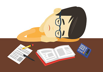 Image showing Student sleeping at the desk with book.