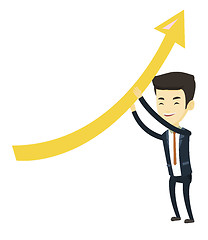 Image showing Business man holding arrow going up.