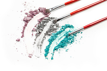 Image showing The colored eyeshadow crushed on white close up for background