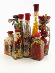 Image showing Vinegar Bottles on White