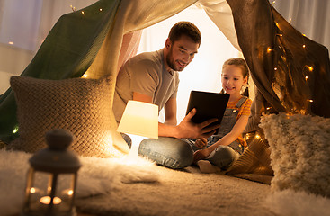 Image showing family with tablet pc in kids tent at home