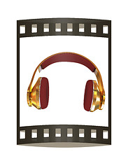 Image showing Golden headphones. 3d illustration. The film strip.