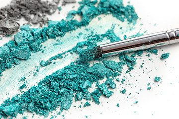 Image showing The colored eyeshadow crushed on white close up for background