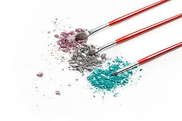 Image showing The colored eyeshadow crushed on white close up for background