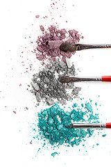 Image showing The colored eyeshadow crushed on white close up for background