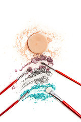 Image showing The colored eyeshadow crushed on white close up for background