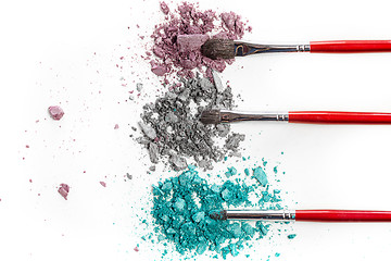 Image showing The colored eyeshadow crushed on white close up for background