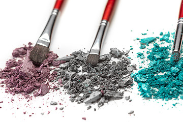 Image showing The colored eyeshadow crushed on white close up for background