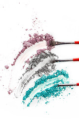 Image showing The colored eyeshadow crushed on white close up for background