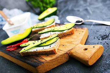 Image showing bread with cheese and with avocado 