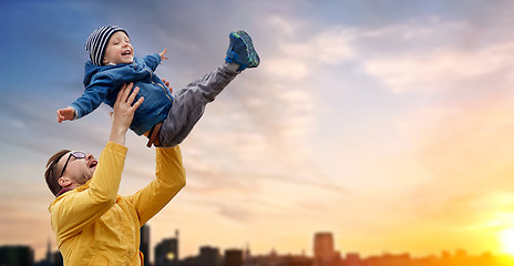 Image showing father with son playing and having fun outdoors