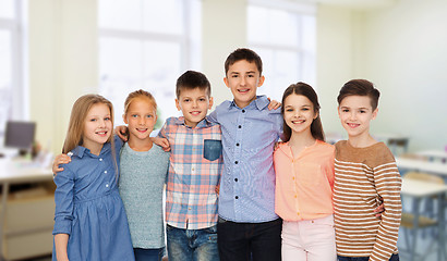 Image showing happy students hugging at school