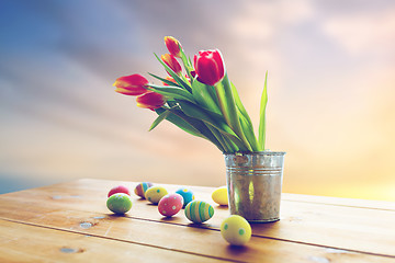 Image showing easter eggs and flowers in bucket