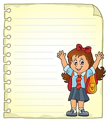 Image showing Notepad page with happy pupil girl