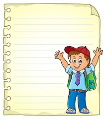 Image showing Notepad page with happy pupil boy