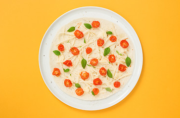 Image showing Vegetarian tortilla on bright yellow background