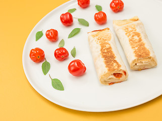 Image showing Cooked vegetarian tortillas on yellow background