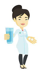 Image showing Pharmacist giving pills and glass of water.