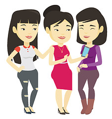 Image showing Three smiling friends looking at mobile phone.