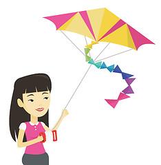 Image showing Young woman flying kite vector illustration.