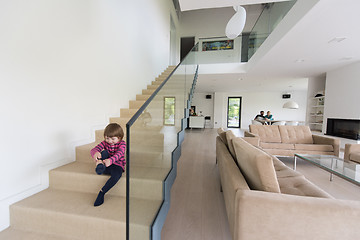 Image showing family with little girl enjoys in the modern living room