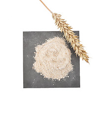 Image showing Wholegrain flour and ear on slate