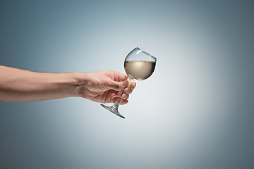 Image showing Close-up view of white wine glass