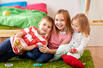 Image showing kids with modelling clay or slimes at home