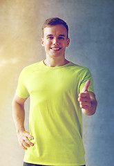 Image showing smiling man in gym