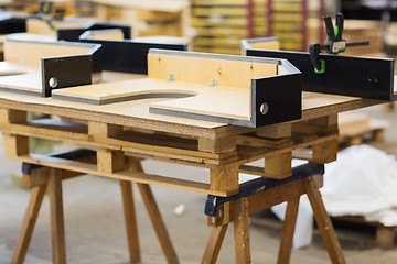 Image showing furniture items on workbench at workshop